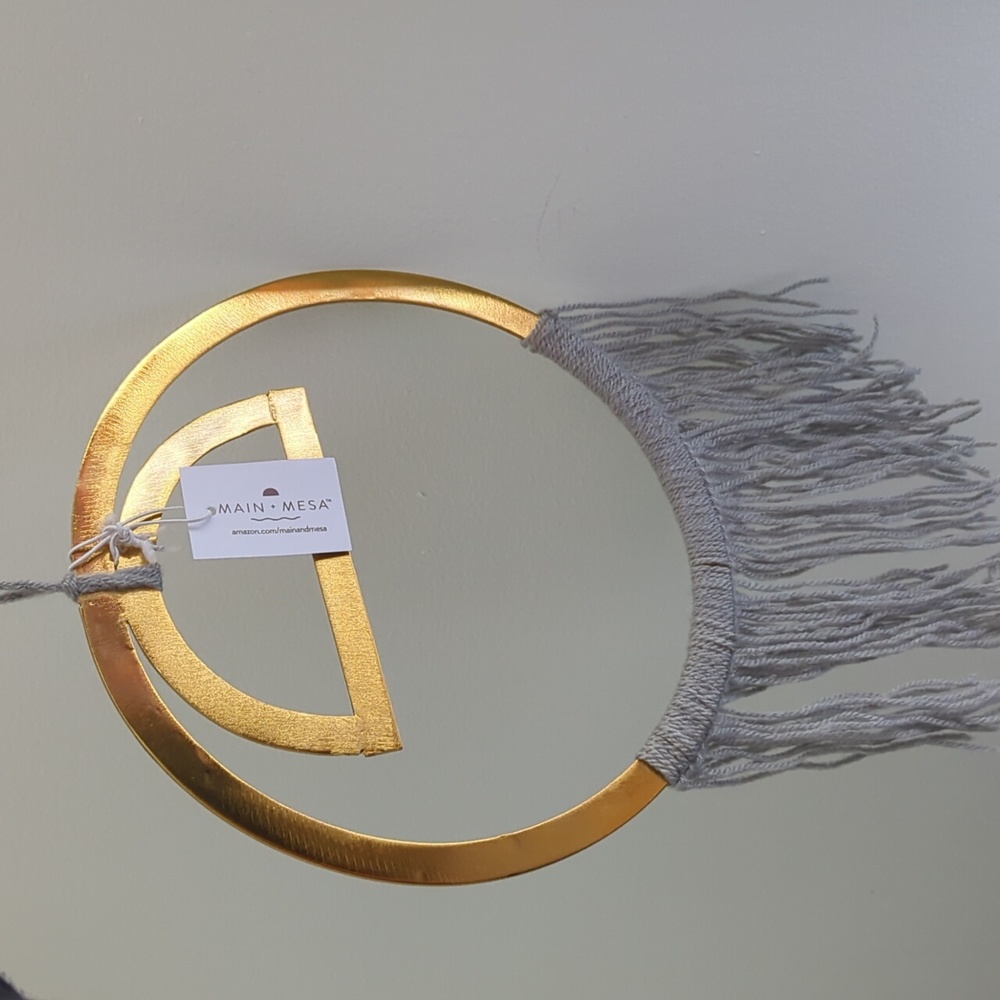 Gold and grey hanging wall decor